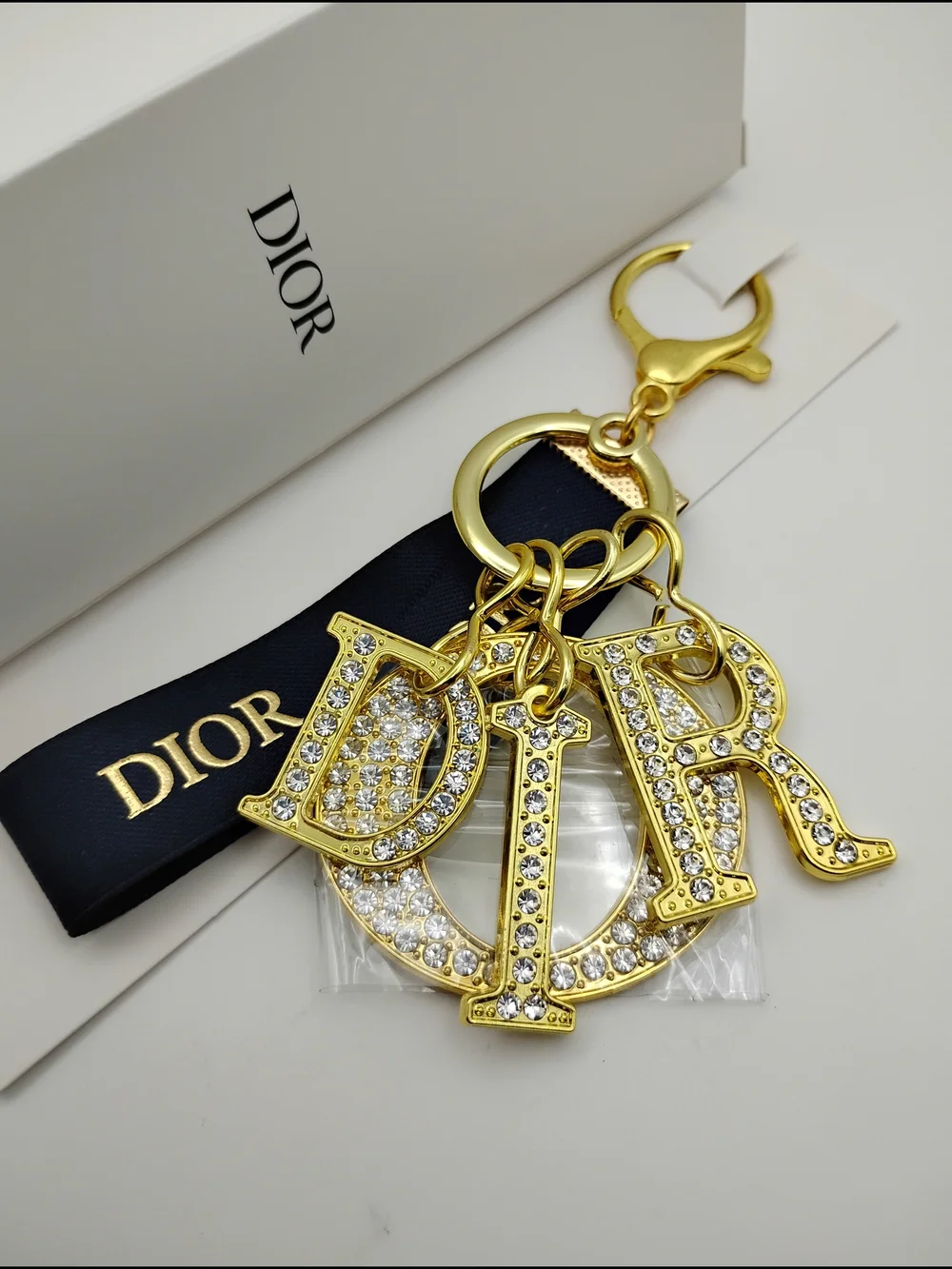 Dior Gold Crystal 'D I O R' Logo Keychain with Black Ribbon BNIB